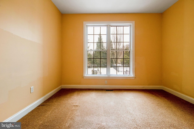 view of carpeted spare room