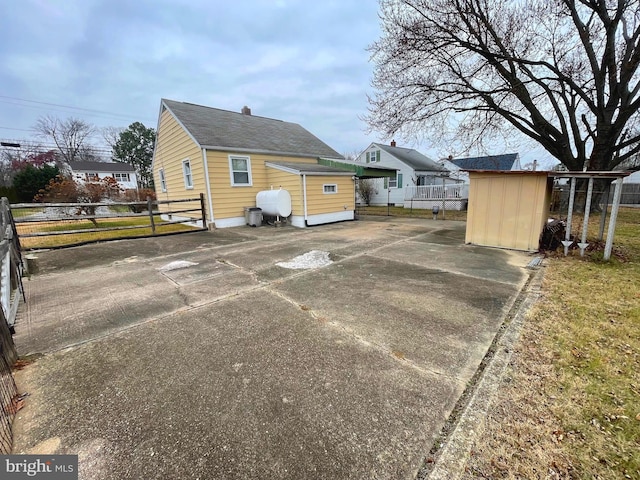 view of home's exterior featuring a storage shed