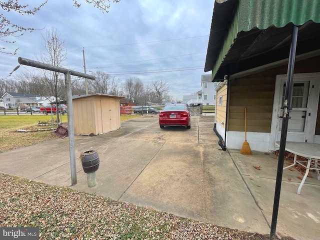 exterior space featuring a storage shed