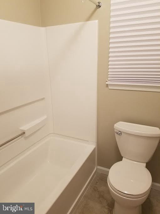 bathroom featuring toilet