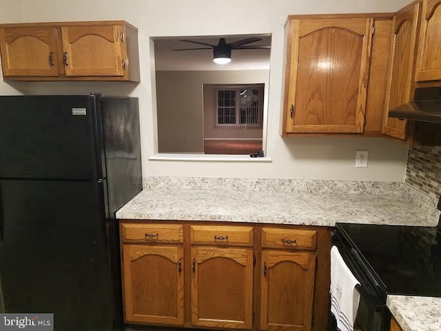 kitchen with black appliances and ceiling fan