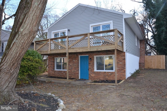 view of front of home with a balcony