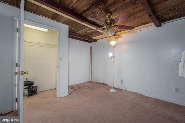 interior space with beamed ceiling, light carpet, and wooden ceiling