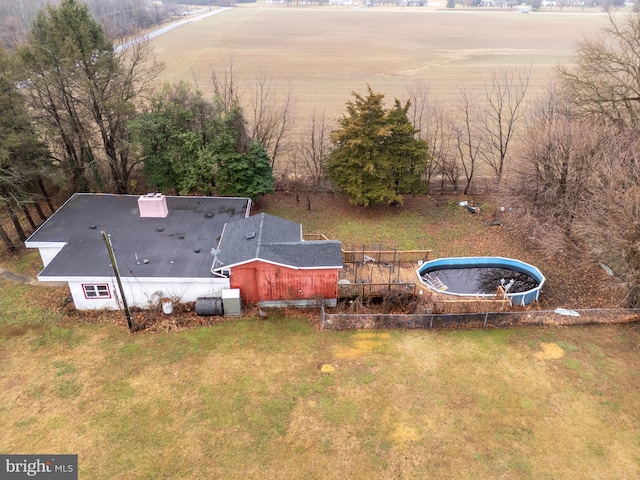 birds eye view of property featuring a rural view