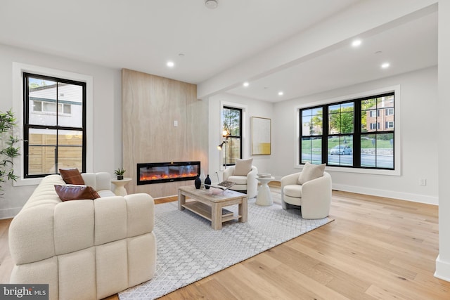 8206 Grubb Rd, Chevy Chase, MD 20815 - living room with wood finished floors, recessed lighting, a fireplace, baseboards, and beamed ceiling