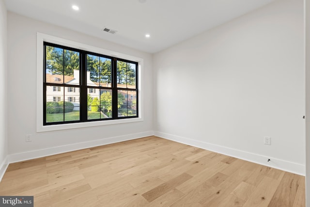 8206 Grubb Rd, Chevy Chase, MD 20815 - empty room featuring light wood finished floors, baseboards, and recessed lighting