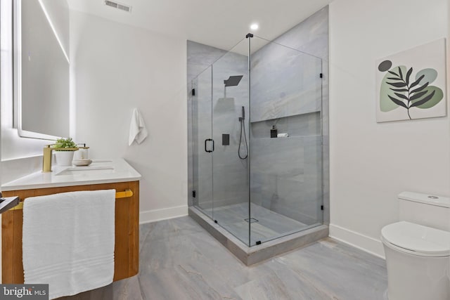 8206 Grubb Rd, Chevy Chase, MD 20815 - bathroom with baseboards, vanity, and toilet