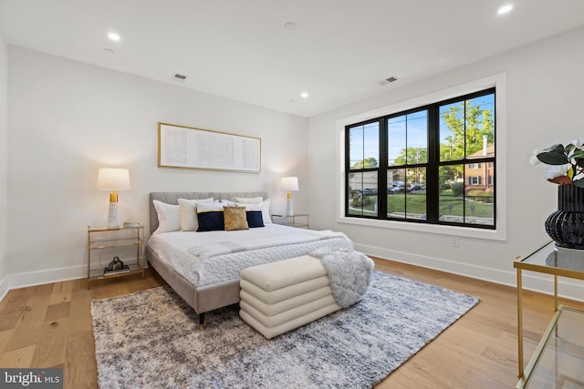 8206 Grubb Rd, Chevy Chase, MD 20815 - bedroom with baseboards, light wood-style floors, and recessed lighting
