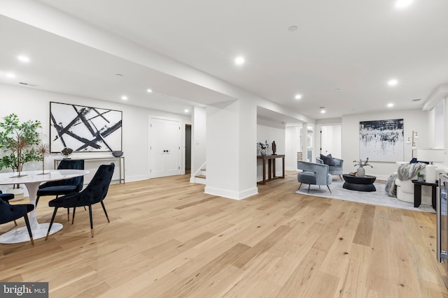 8206 Grubb Rd, Chevy Chase, MD 20815 - exercise room featuring light wood-type flooring, recessed lighting, and baseboards
