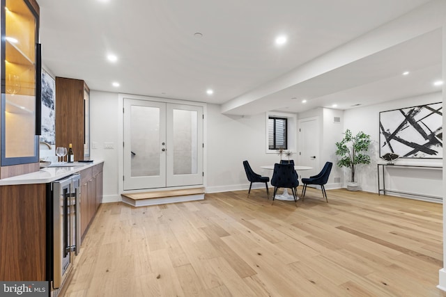 8206 Grubb Rd, Chevy Chase, MD 20815 - interior space featuring wine cooler, french doors, light wood-style floors, recessed lighting, and baseboards