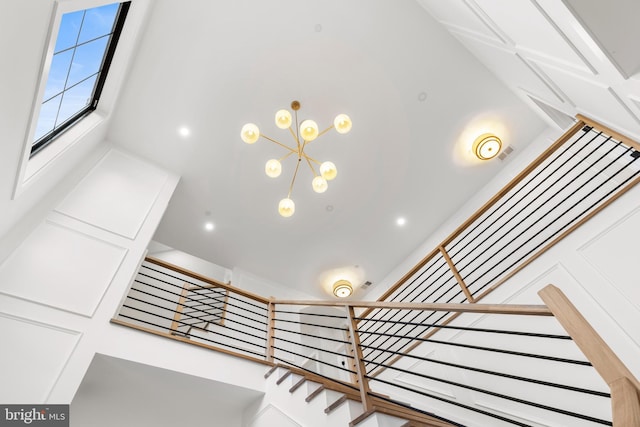 8206 Grubb Rd, Chevy Chase, MD 20815 - stairs with a chandelier