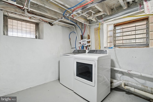 laundry area featuring washing machine and dryer