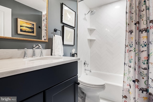 full bathroom featuring shower / bath combination with curtain, vanity, and toilet