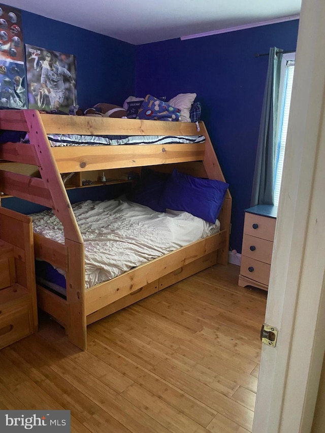 bedroom with light wood-type flooring