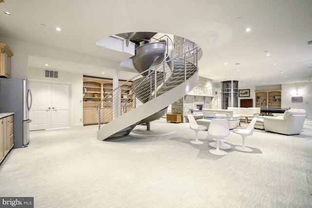 interior space with a stone fireplace