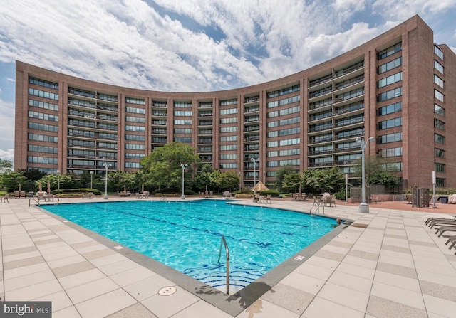 view of pool with a patio area