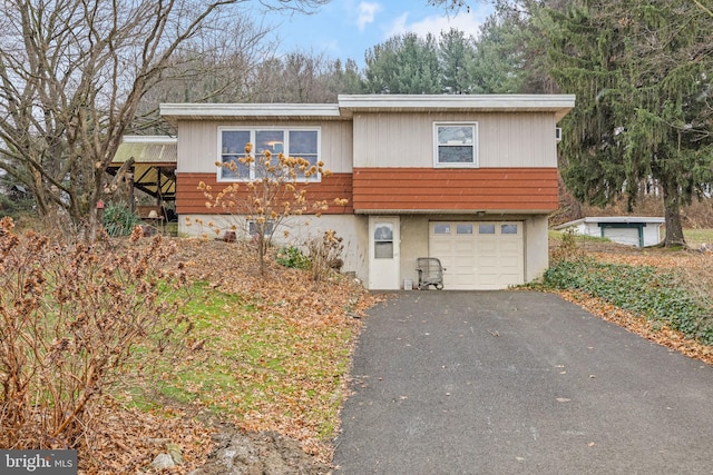 view of front of house featuring a garage and driveway