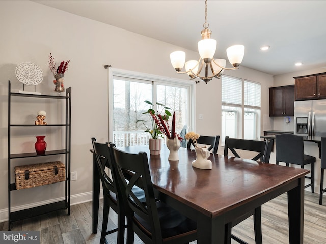 dining area featuring a chandelier