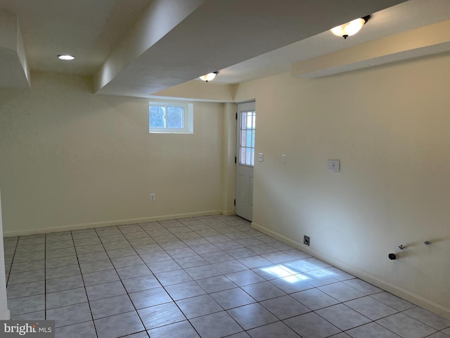 basement with light tile patterned floors