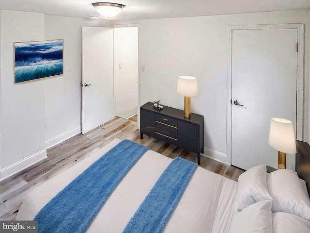 bedroom featuring hardwood / wood-style flooring