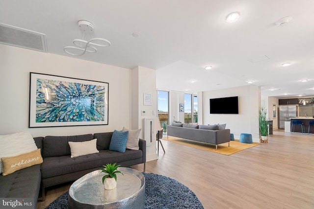 living room with light wood-type flooring