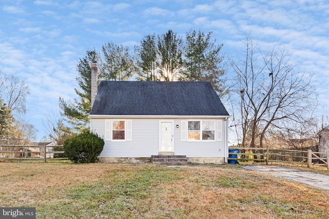 view of front of property with a front lawn