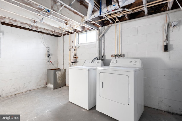 laundry area with washing machine and dryer