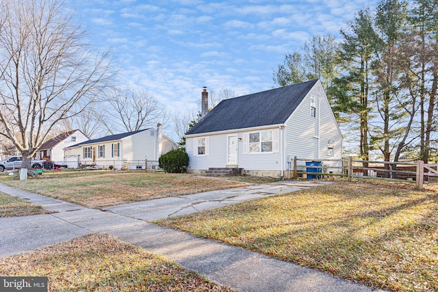 view of front facade with a front lawn