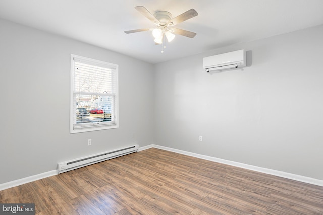 empty room with an AC wall unit, ceiling fan, hardwood / wood-style floors, and a baseboard heating unit