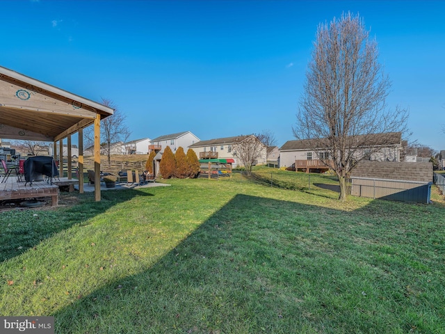 view of yard with a deck