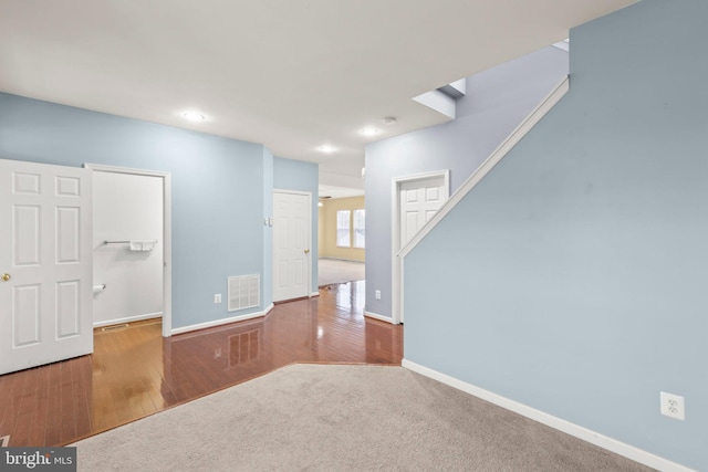 empty room featuring hardwood / wood-style flooring