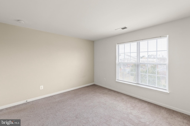 view of carpeted spare room