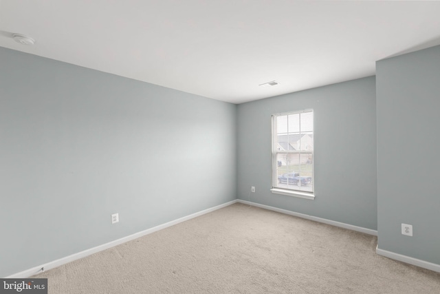 view of carpeted spare room