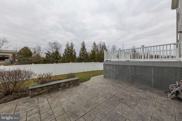 view of patio with a wooden deck