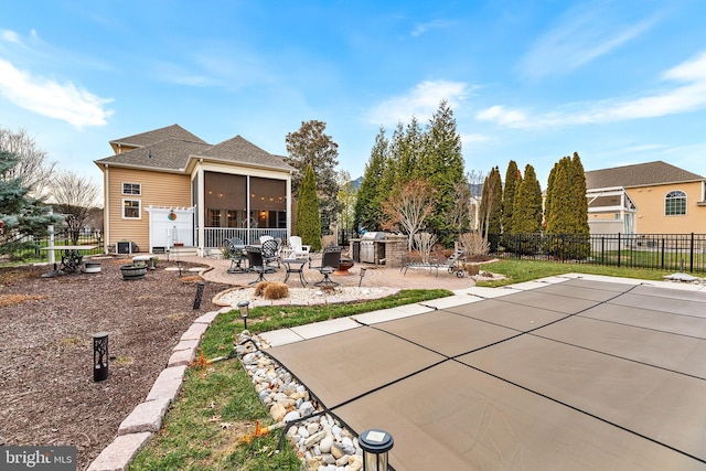 back of house featuring a patio area