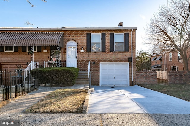 view of front of home with a garage