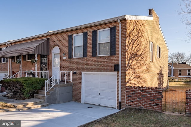 view of front of home with a garage