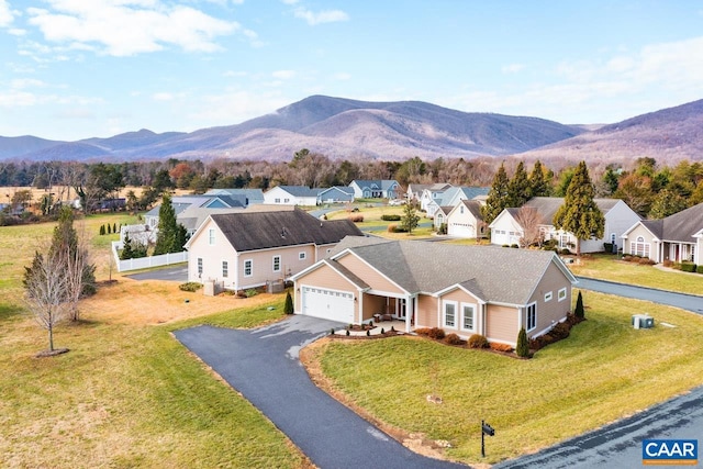 birds eye view of property featuring a mountain view