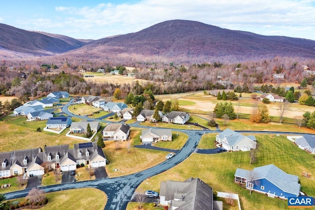 drone / aerial view featuring a mountain view