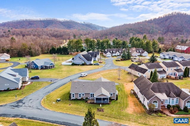 drone / aerial view featuring a mountain view