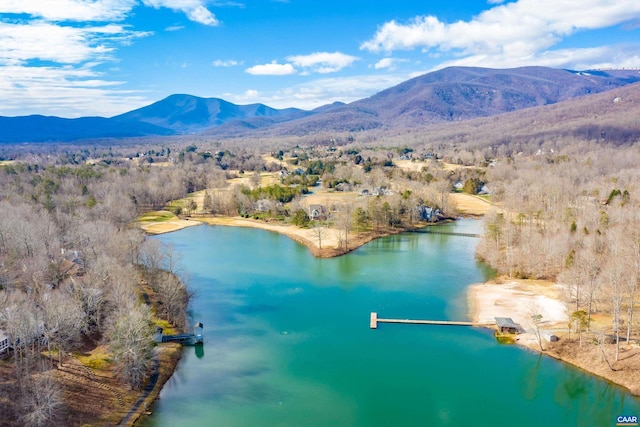 bird's eye view with a water and mountain view