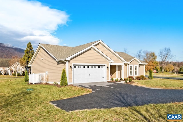 view of front facade featuring central AC, a front lawn, and a garage