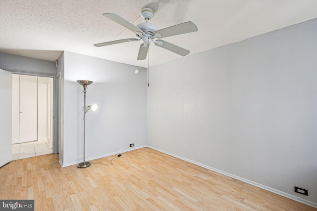 1326 Spruce St Unit 1908, Philadelphia, PA 19107 - unfurnished bedroom featuring wood finished floors, a textured ceiling, and ceiling fan