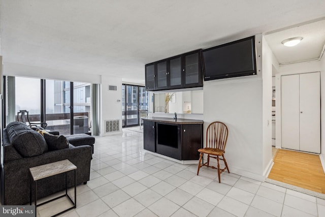 1326 Spruce St Unit 1908, Philadelphia, PA 19107 - living room featuring light tile patterned flooring