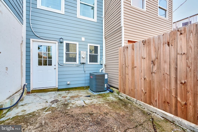 exterior space featuring central AC unit