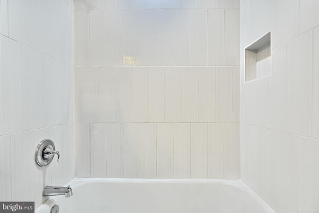 bathroom featuring shower / washtub combination