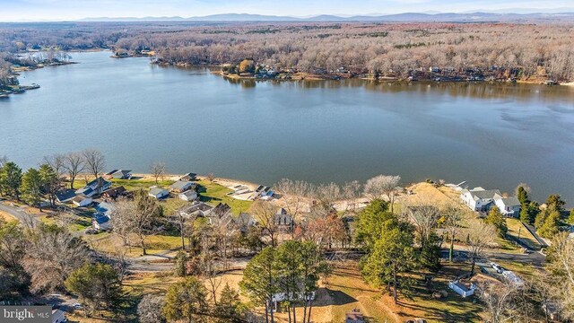 bird's eye view featuring a water and mountain view