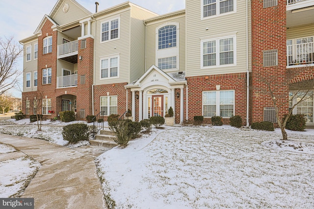 view of snow covered property