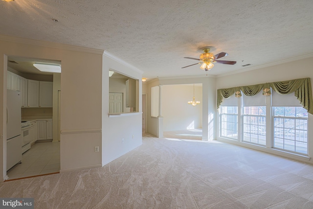 carpeted spare room featuring ceiling fan with notable chandelier, ornamental molding, and a textured ceiling