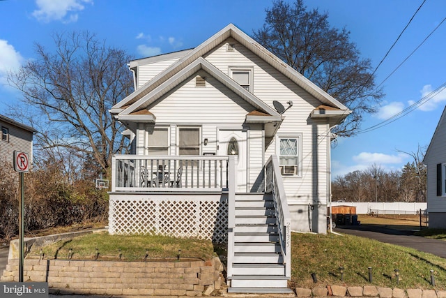 bungalow-style home with a porch